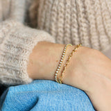 14 Karat Yellow Gold Ribbon Set Diamond Tennis Bracelet