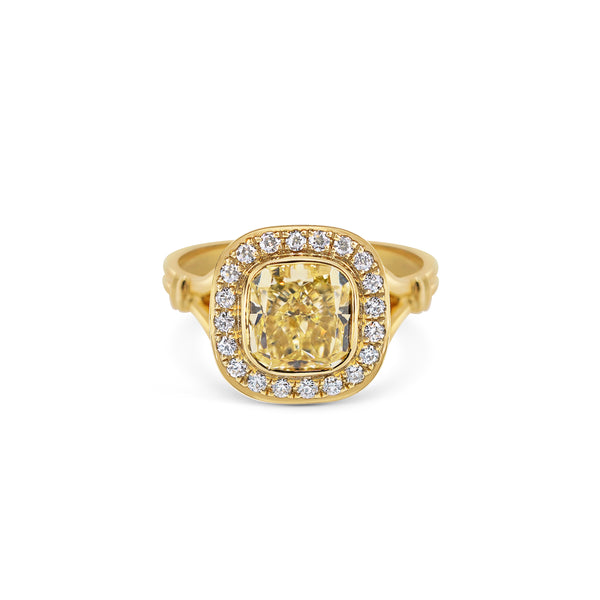 Yellow Diamond and Halo Ring